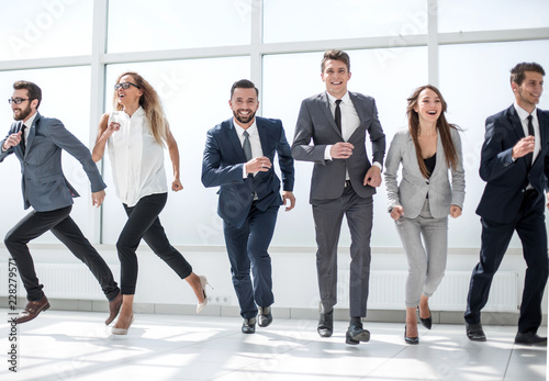 business team running together