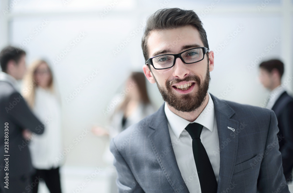 successful businessman on the background of the office successful businessman on the background of the office