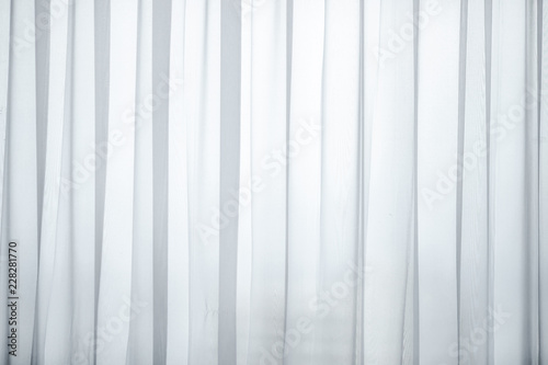 The background of the white curtains, modern design, often used in homes or resorts, hotels, restaurants, cafes, show products.