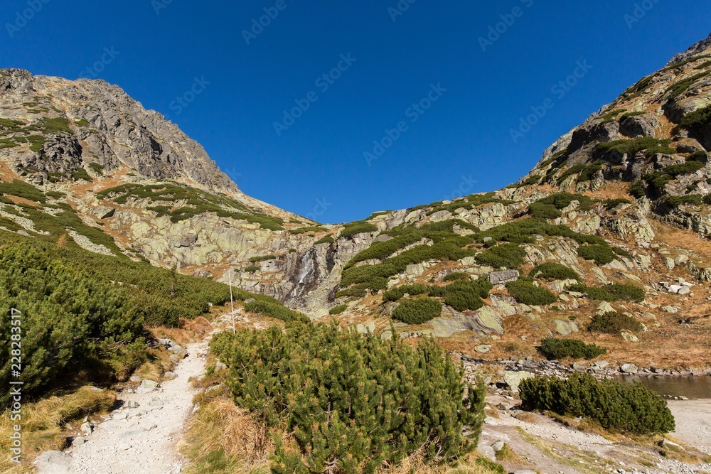 Skok waterfall. High Tatras mountains on a summer day.