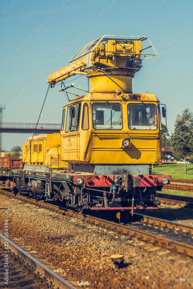 Old railway crane, track repair Old railway crane, track repair