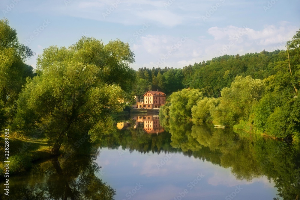 River Luznice,trees and house,Bechyne. River Luznice,trees and house,Bechyne.
