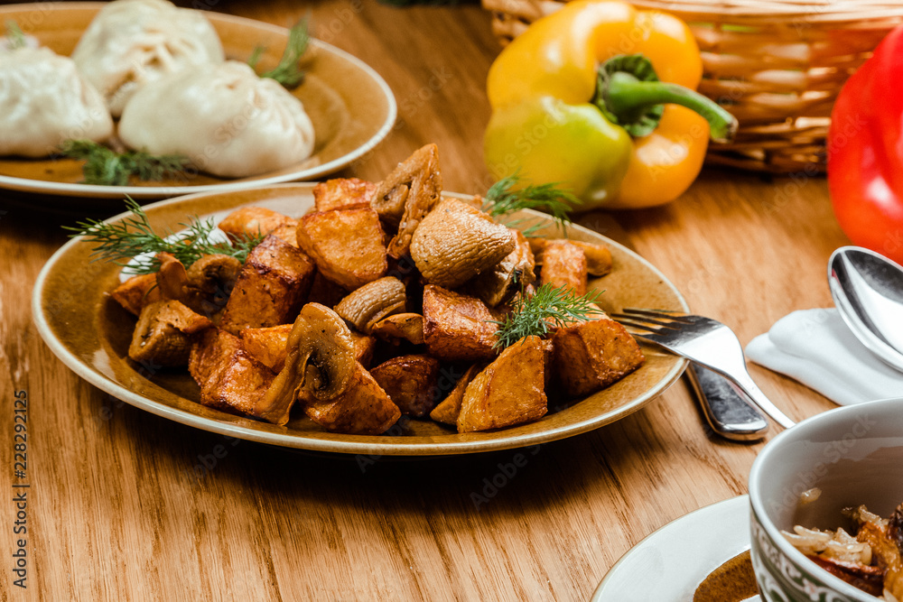 Homemade Food: Potatoes with mushrooms closeup. horizontal view from above Homemade Food: Potatoes with mushrooms closeup. horizontal view from above