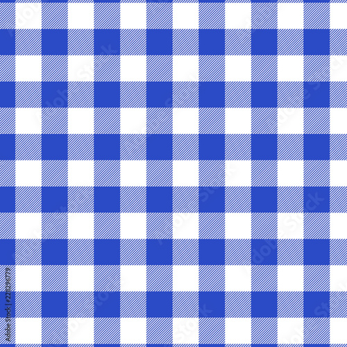 Tartan pattern. Blue Scottish cage. Scottish checkered background. Traditional Scottish ornament. Scottish plaid in blue colors. Fabric texture