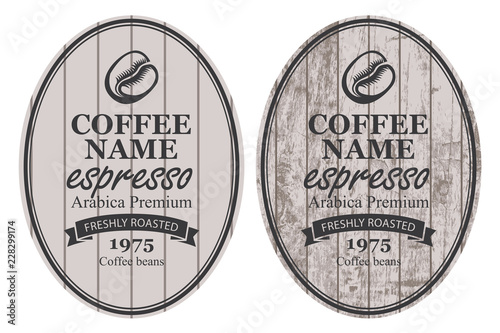 Set of two vector labels for freshly roasted coffee beans with ribbon in oval frame in retro style on striped wooden background with inscription Espresso