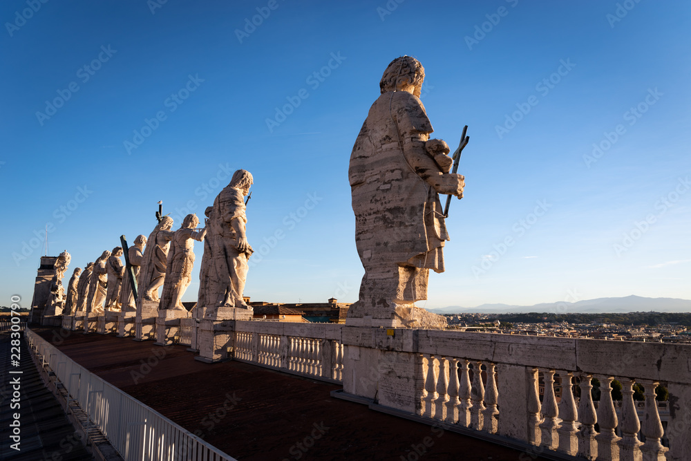 Saint Peter Basilica saints sculptures from behind. Jesus Christ in Vatican