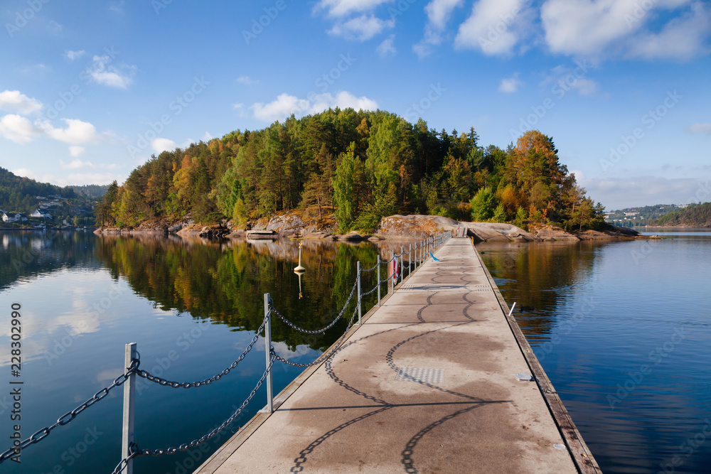 Walkway to Kattoya island from Olavsberget bathing place at Eidangerfjord near Porsgrunn Telemark Norway Scandinavia