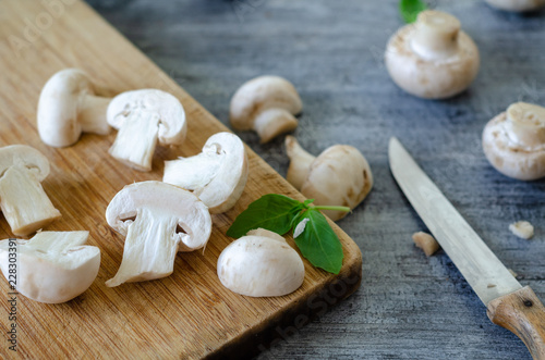 Natural organic raw mushrooms of sliced on table