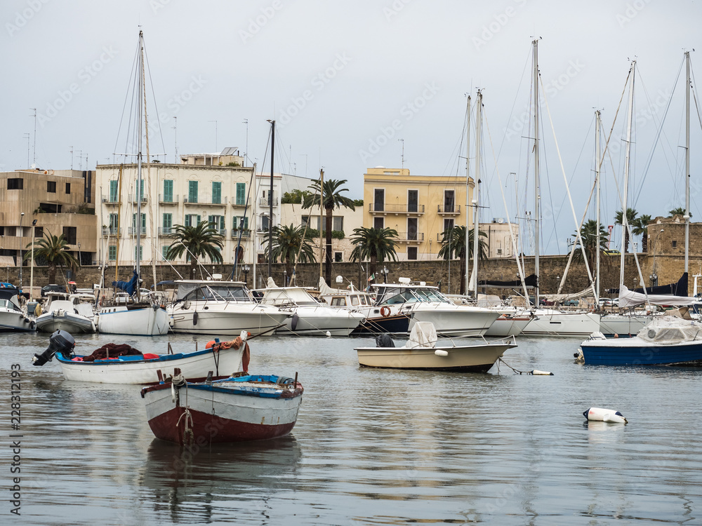 Sea bay and fishing boats on the background of beautiful, Italian, old houses