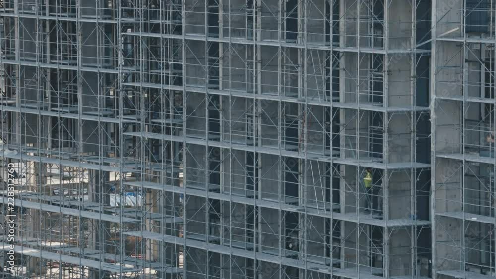 Construction workers on scaffold
