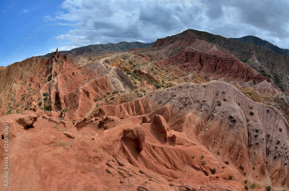 Colourful Skazka canyon,made by water and wind, located on the shore of Issyk-Kul lake,Kyrgyzstan,Central Asia