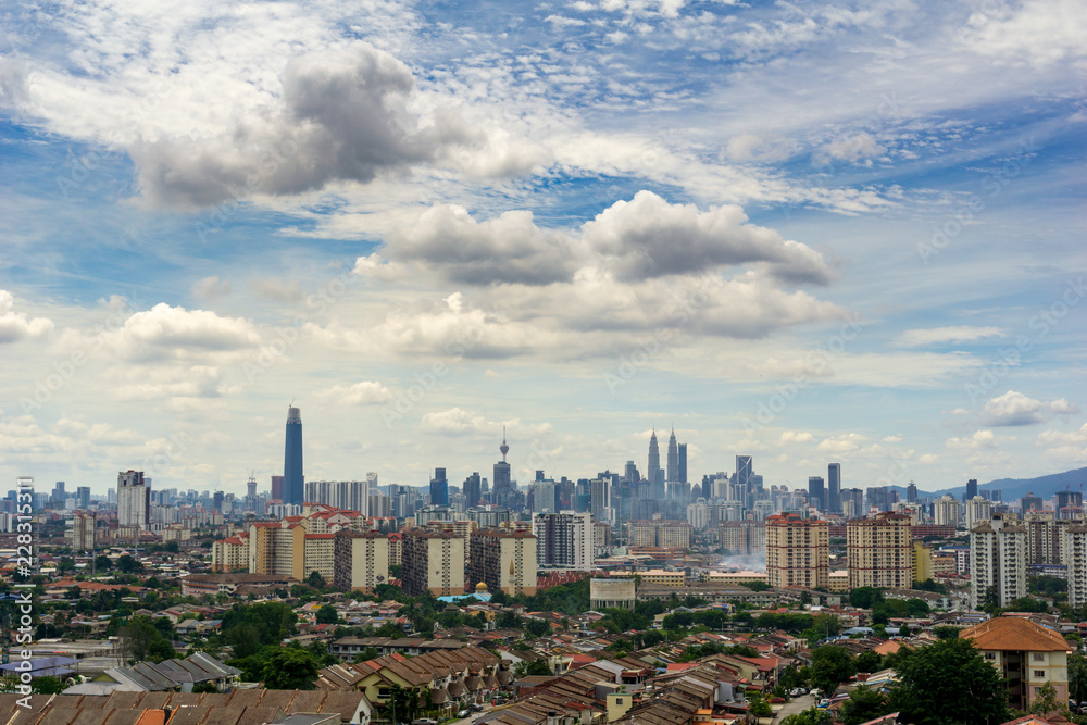 View of cloudy day over downtown Kuala Lumpur, capital city of Malaysia.	