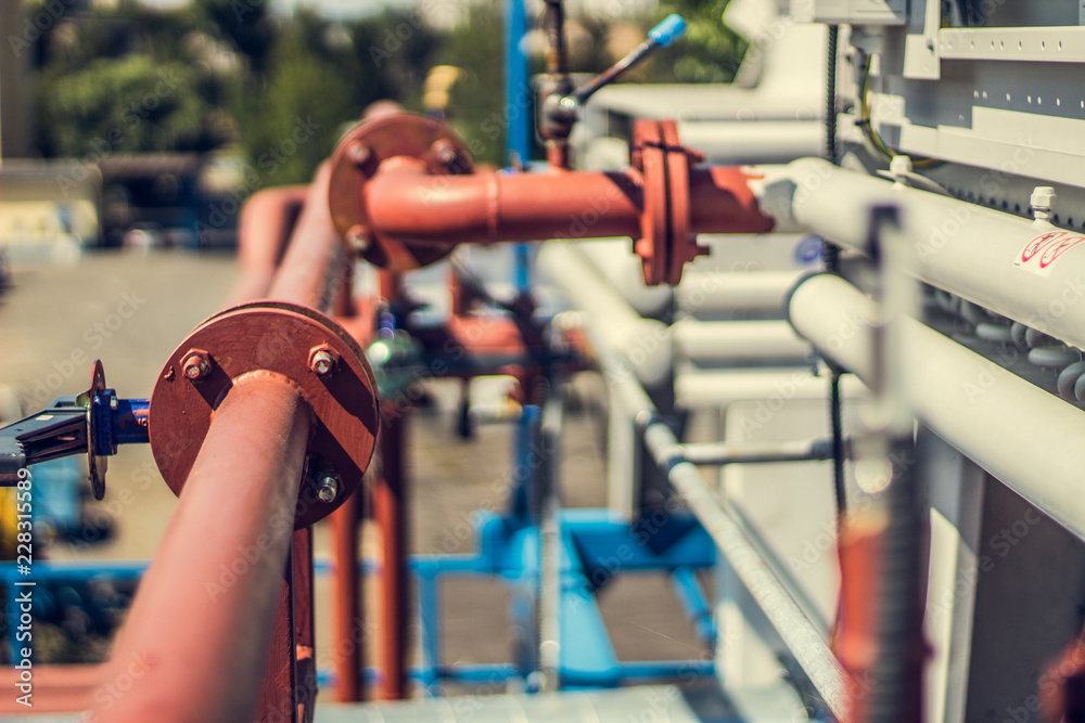 .Cooling towers at a private enterprise, pipes, valves, fans. .Cooling towers at a private enterprise, pipes, valves, fans.