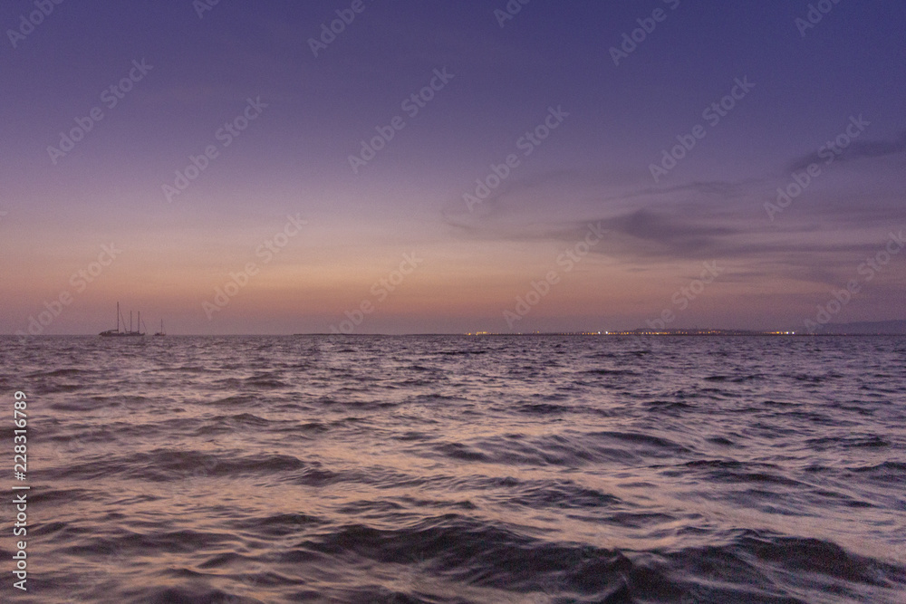 Obraz premium Algarve dusk seascape at Ria Formosa wetlands reserve, southern Portugal.