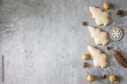 Culinary background on the Christmas theme - baking Christmas tree cookies, ingredients, accessories, there is a place for an inscription