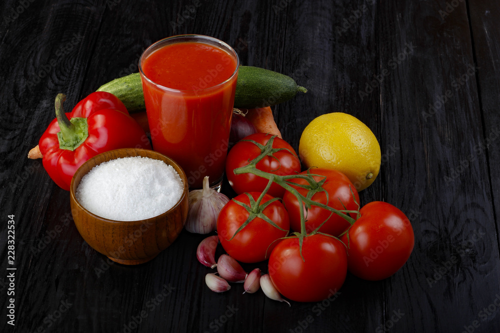 tomato juice and vegetables on wooden background tomato juice and vegetables on wooden background