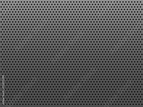 Perforated gray metal plate with round holes. Industrial blank steel background.
