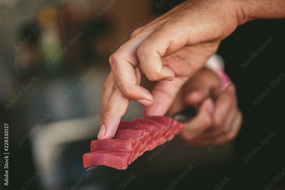 Crop chef serving tuna fish