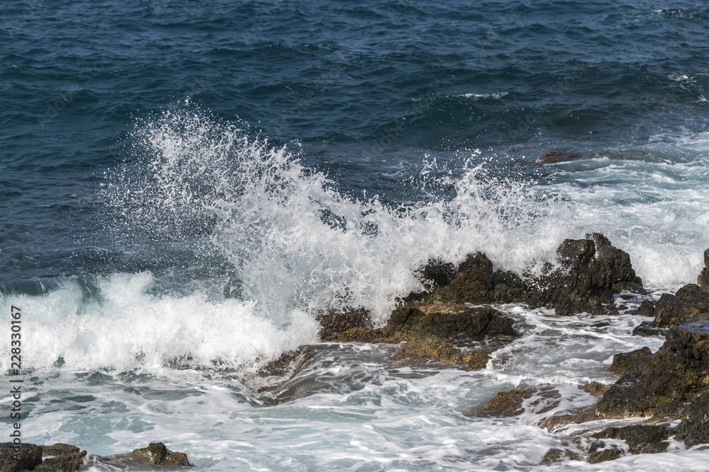 waves crashing on rocks waves crashing on rocks