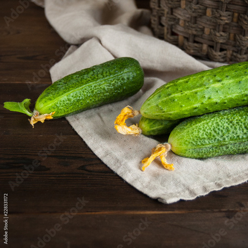 fresh cucumbers on wooden table