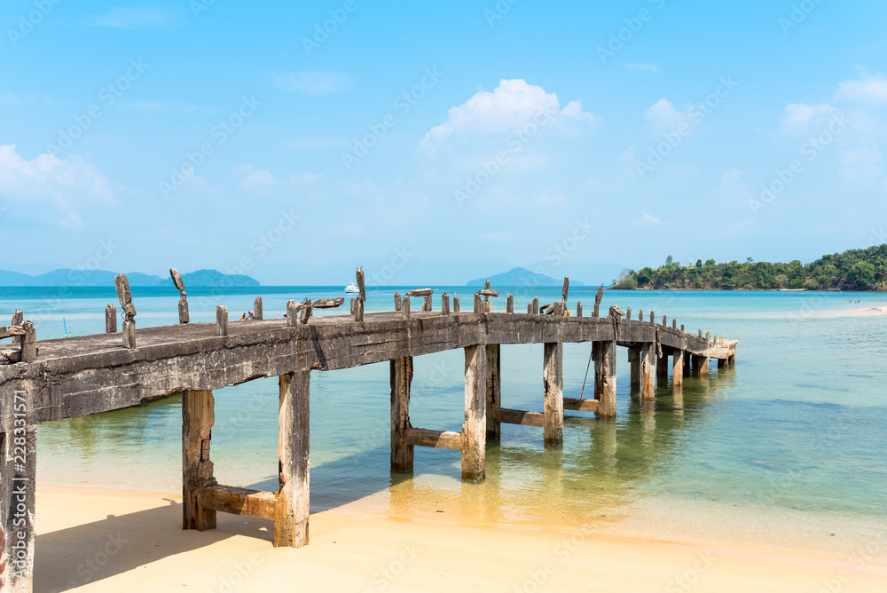 Rotten pier at the east-side beach named Ao Mae Mai on the island of Ko Phayam in Thailand