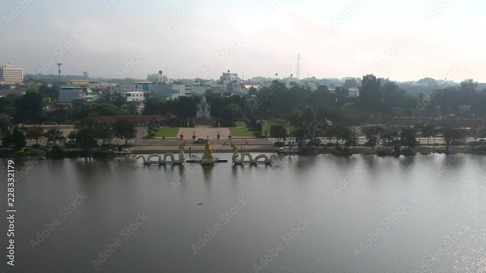 The high angle view of the Prayao Lake from a drone, can see the Naga statue, the local holy thing in this province. The high angle view of the Prayao Lake from a drone, can see the Naga statue, the local holy thing in this province.