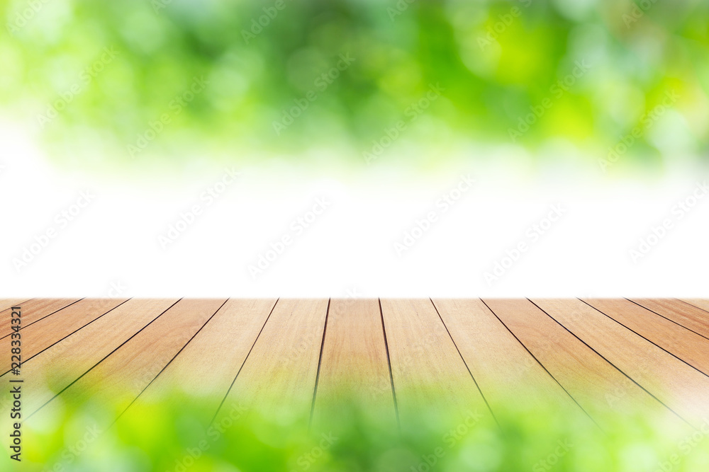 Wooden board or table and abstract blurred background. Free space can be used for photo montage or product display design and advertising