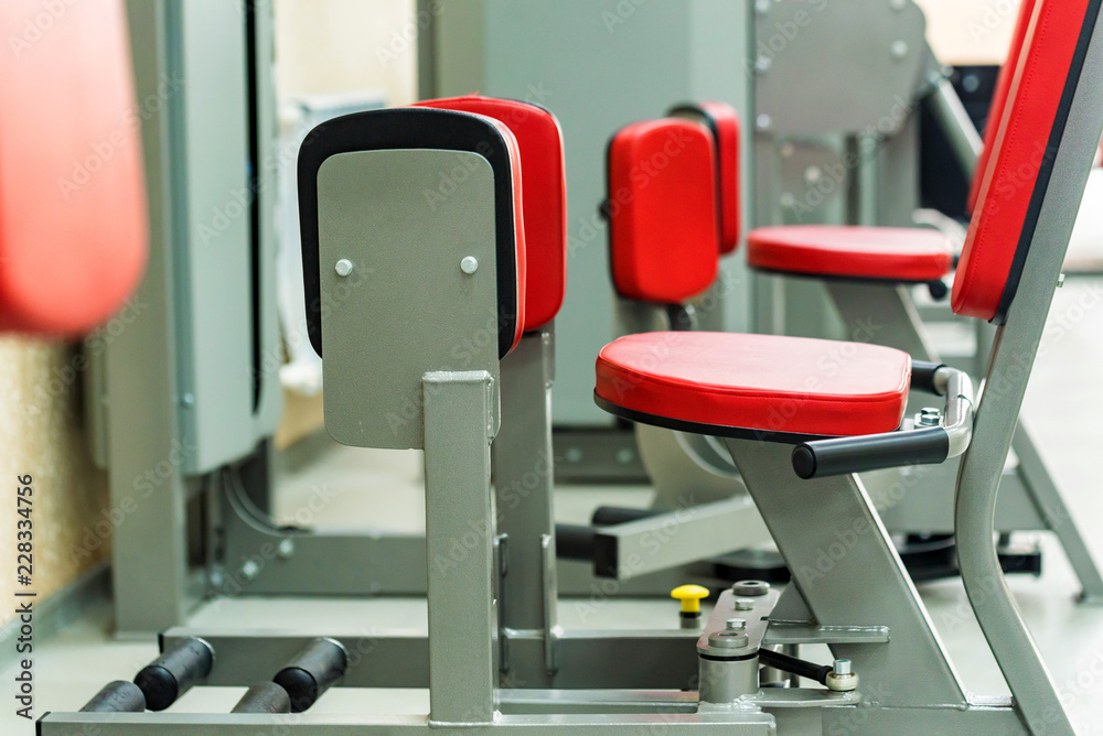 Close-up sport exercise equipment in modern gym
