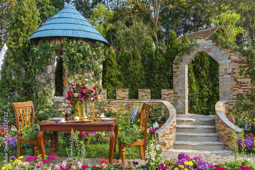 Fototapeta Naklejka Na Ścianę i Meble -  Landscaped backyard flower garden