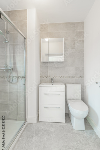 Shower cabin  cabinets in a bathroom.