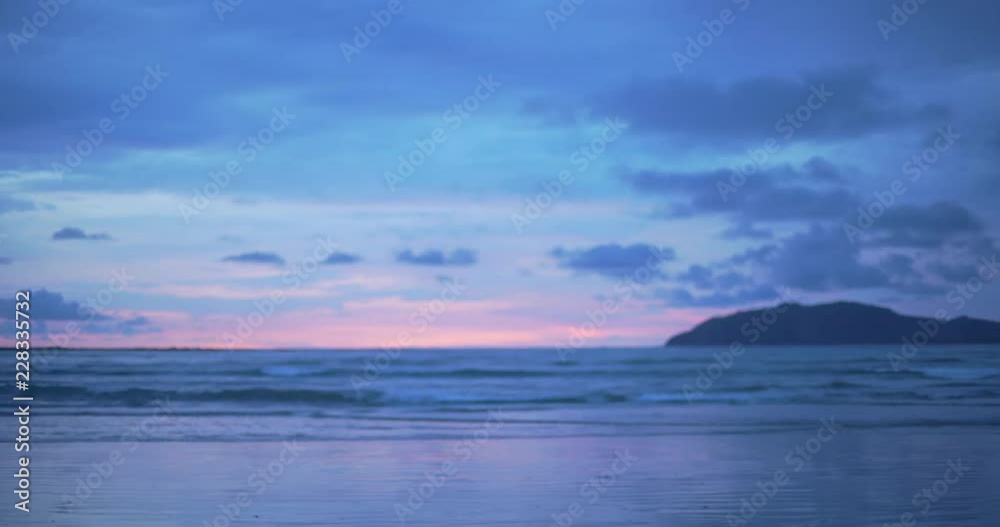 Out of focus background plate of beautiful purple and blue sunset on the beach in Costa Rica for compositing or keying. Blurred or defocused shot of ocean sun set for green screen composite. 4k Out of focus background plate of beautiful purple and blue sunset on the beach in Costa Rica for compositing or keying. Blurred or defocused shot of ocean sun set for green screen composite. 4k