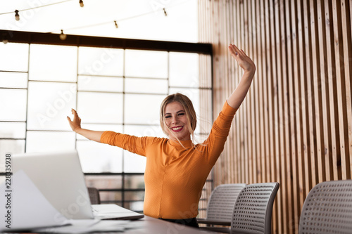 Young pretty woman relax in workplace. Comfort and health job.