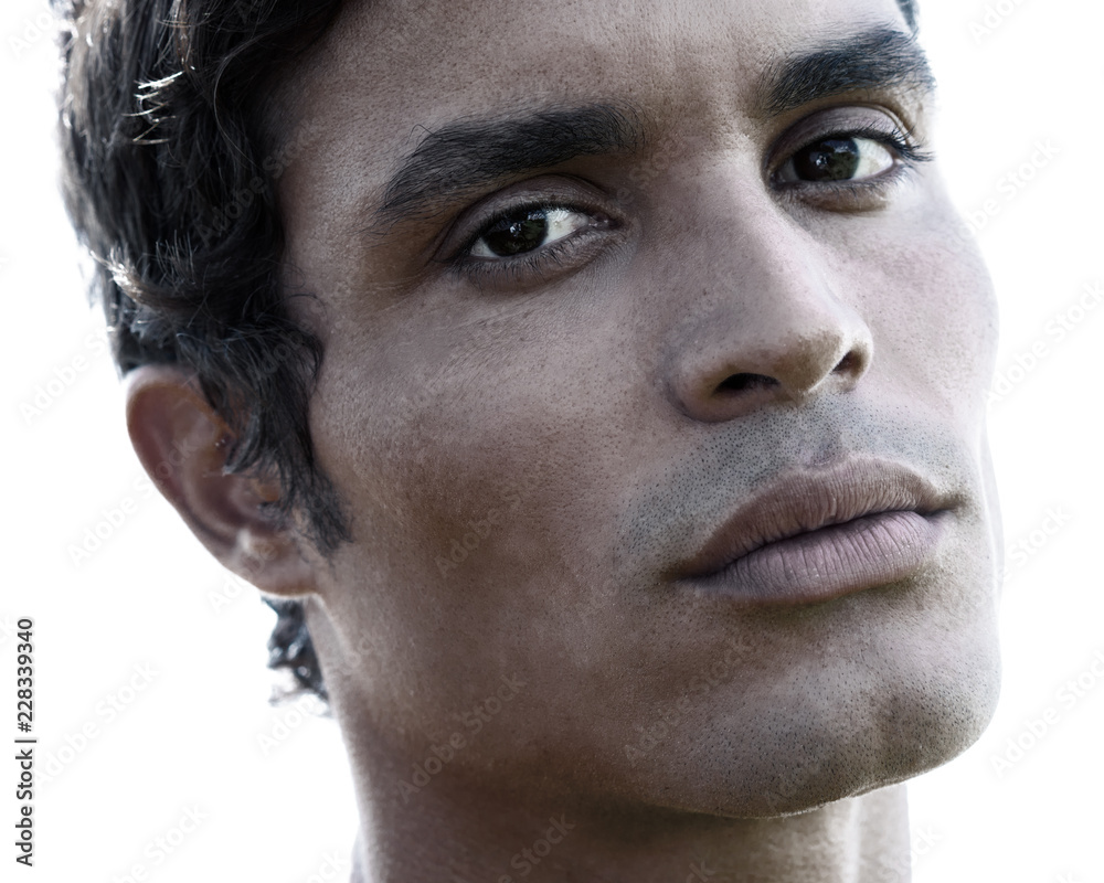Close up portrait of healthy man with black hair, strong features, looking firmly into the camera Close up portrait of healthy man with black hair, strong features, looking firmly into the camera