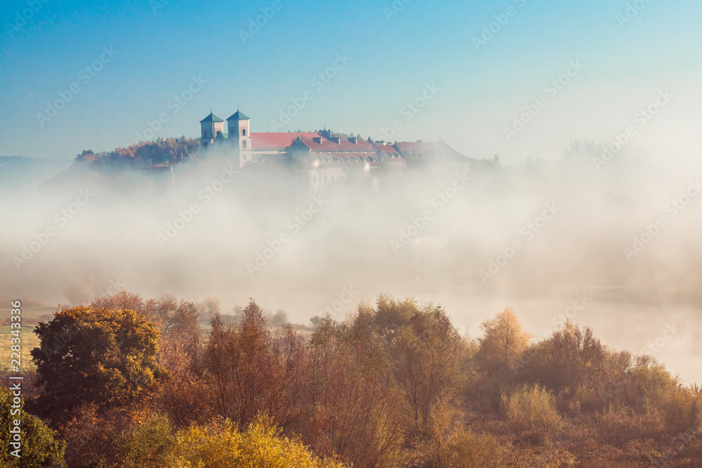 Abbey Tyniec surrounded by meandering Vistula river in colorful autumn scenery. Worth seeing nature reserve of Krakow