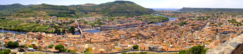 Bosa, Italy - Panoramic view of the historic town of Bosa at the western coast of Sardegna by the Fiume Temo river and Bosa Marina in the background