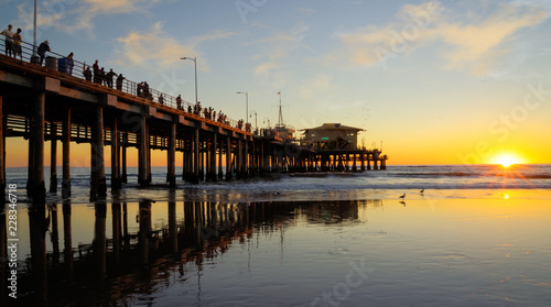 old wooden pier at sunset © James