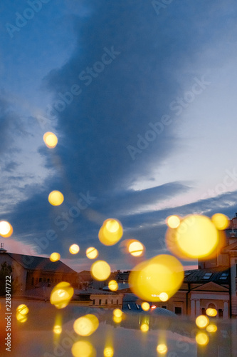 Yellow bokeh. Blurred lights against the backdrop of the city