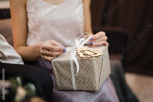 girl holding a gift, gift wrap