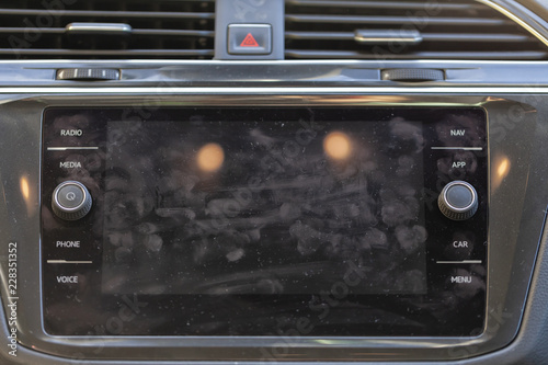 The screen of a GPS navigator on board totally dirty