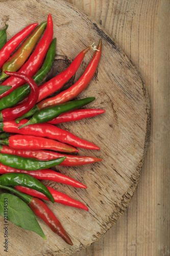 heap of red chili pepper on wooden background