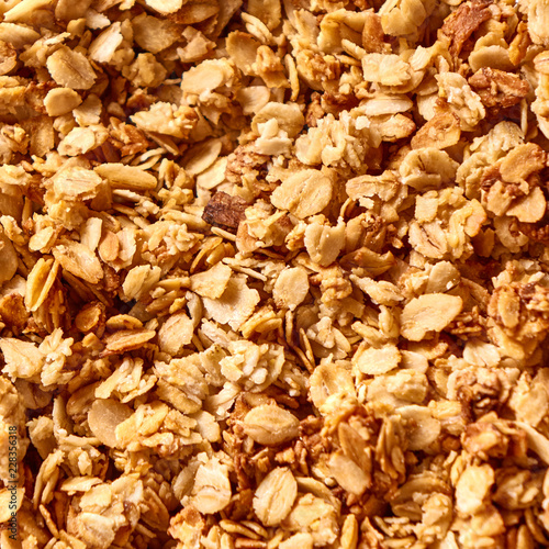 Texture oatmeal granola or muesli as background. Organic homemade Granola Cereal oats. Top view.