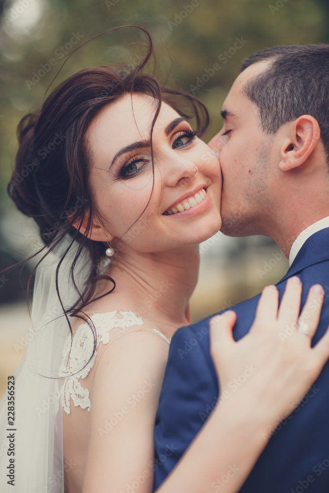 Sensual portrait of a young couple. Wedding photo outdoor Sensual portrait of a young couple. Wedding photo outdoor