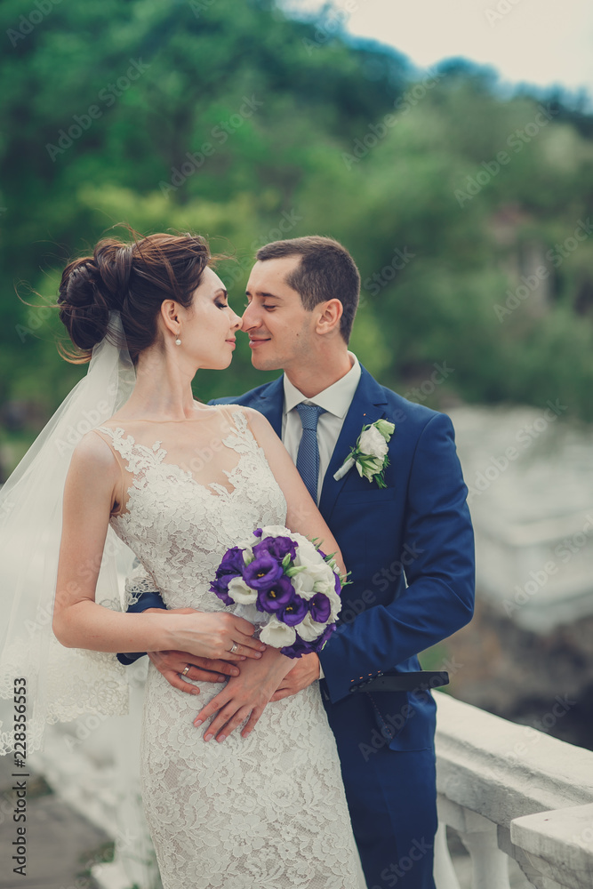 Sensual portrait of a young couple. Wedding photo outdoor