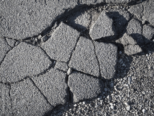 Tableau sur toile damaged asphalt from above