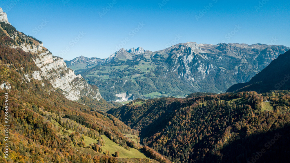 Drone photography of swiss alps mountains in Glarus Klöntalersee Switzerland Schweiz Valley Lake
