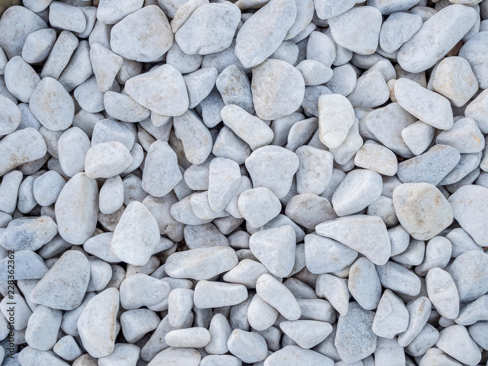 white marble stones of different sizes - background white marble stones of different sizes - background