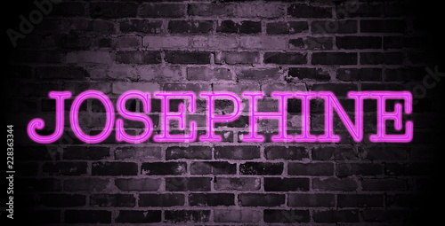 first name Josephine in pink neon on brick wall