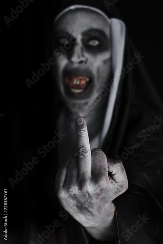 Cuadro en lienzo frightening evil nun giving the finger