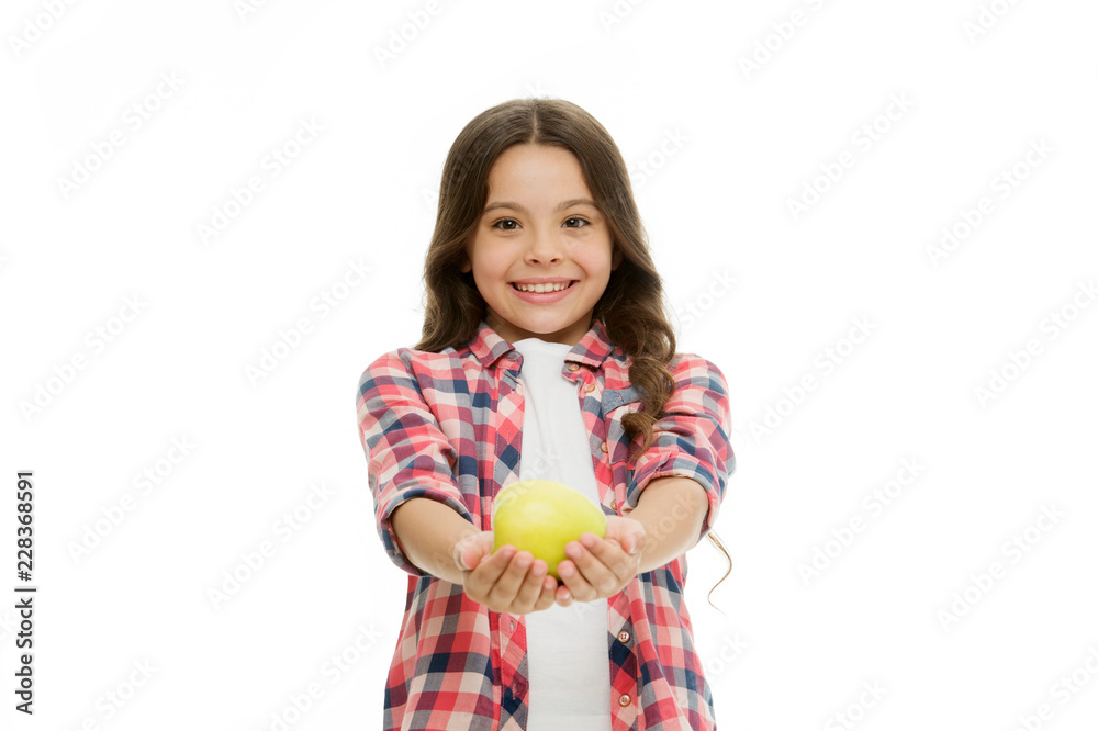 Apple vitamin snack. Girl cute long curly hair holds apple fruit white background. Child girl casual clothes holds apple. Child kid happy face like apple. Healthy nutrition diet. School snack concept Apple vitamin snack. Girl cute long curly hair holds apple fruit white background. Child girl casual clothes holds apple. Child kid happy face like apple. Healthy nutrition diet. School snack concept