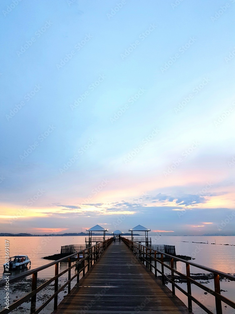 Wooden pier during sunset